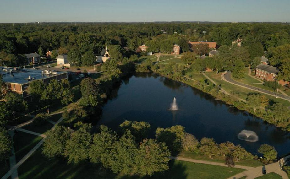 Aerial view of campus with lake