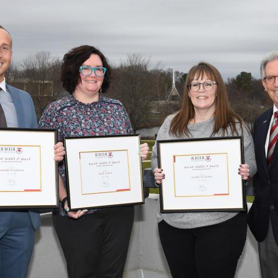 Elliot award winners with President Dell'Omo